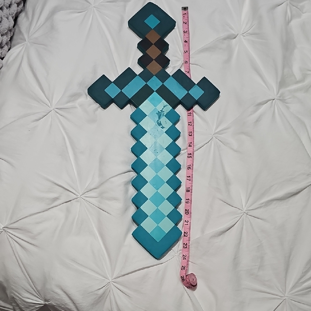 Pixelated Blue Sword Toy